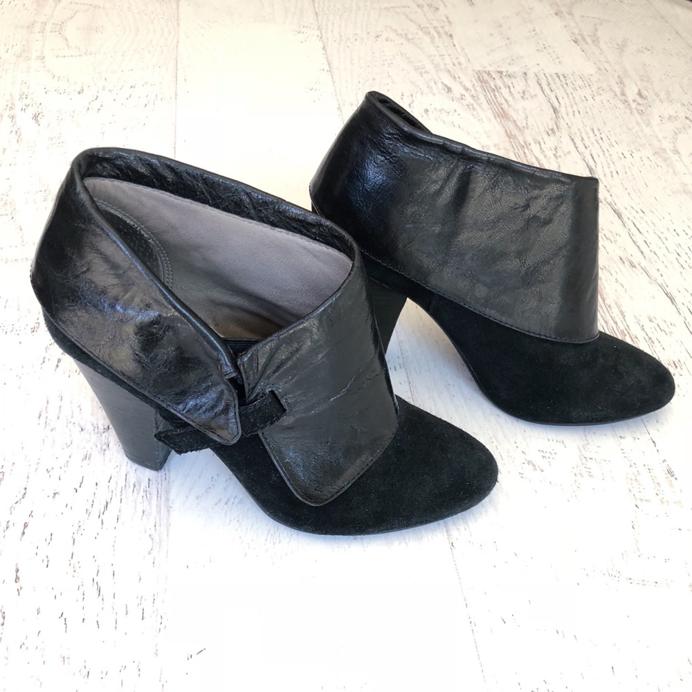 Black suede ankle booties with foldover detail